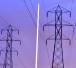 Flourescent tube glowing under electric power lines
