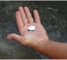 A miner holds elemental mercury