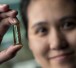 UCI chemist Reginald Penner and doctoral student Mya Le Thai, shown, have developed a nanowire-based battery technology that allows lithium ion batteries to be recharged hundreds of thousands of times. Steve Zylius/UCI