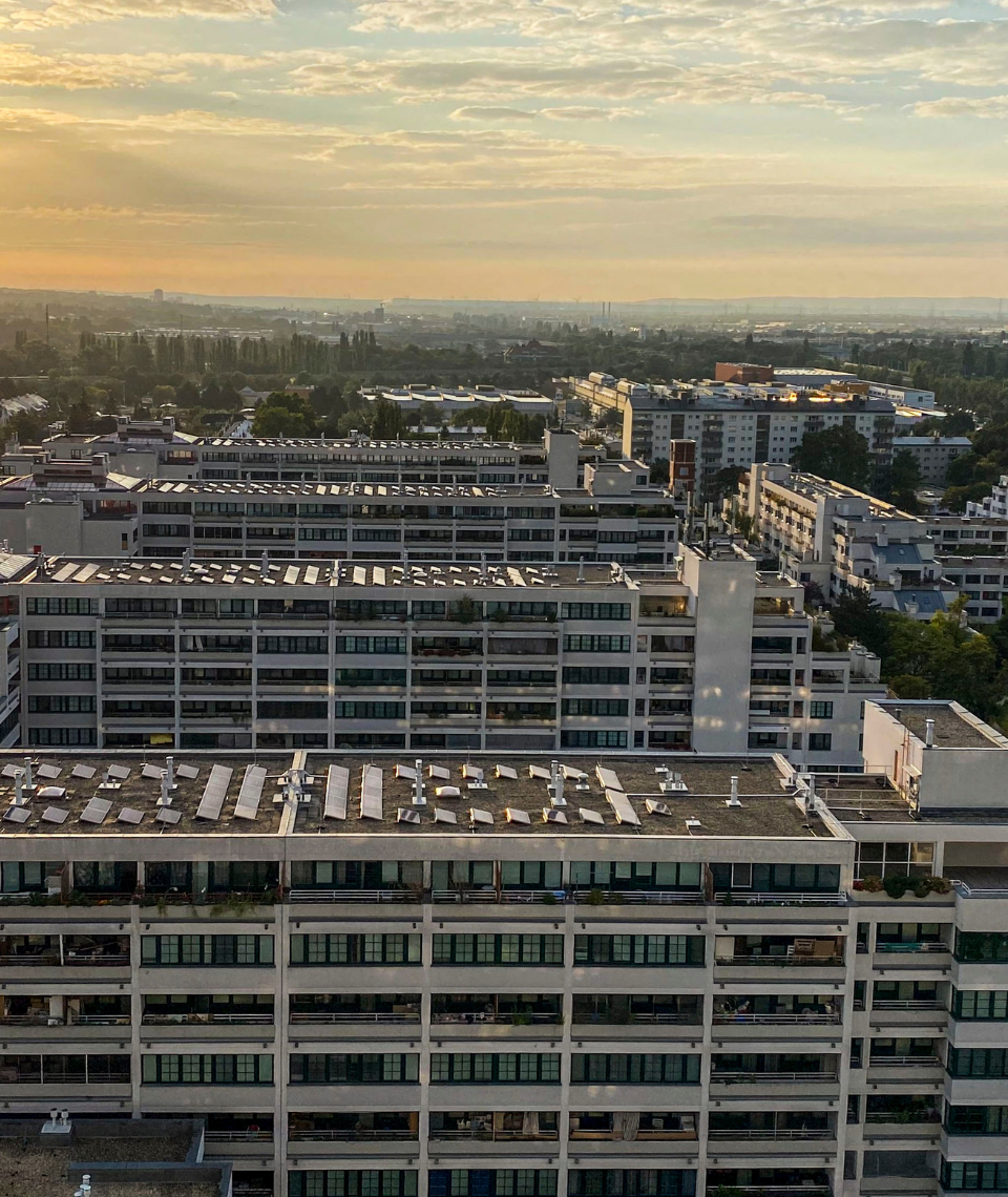 Frühmorgens, Sonnenaufgang über dem Gemeindebau am Schöpfwerk, Fotocredit: Energieleben Redaktion